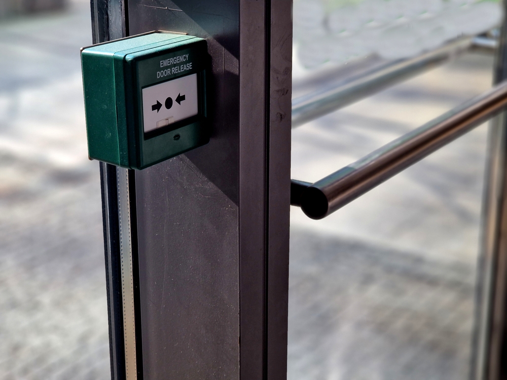 Emergency door alarm on a commercial glass door