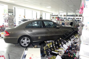 Car crashed through a commercial storefront window inside of boutique store