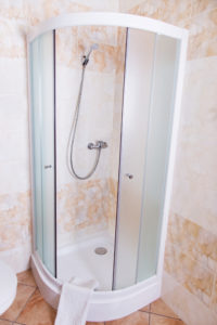 Round shower door made of glass