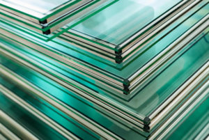 Tempered clear sheets of window glass stacked on top one another