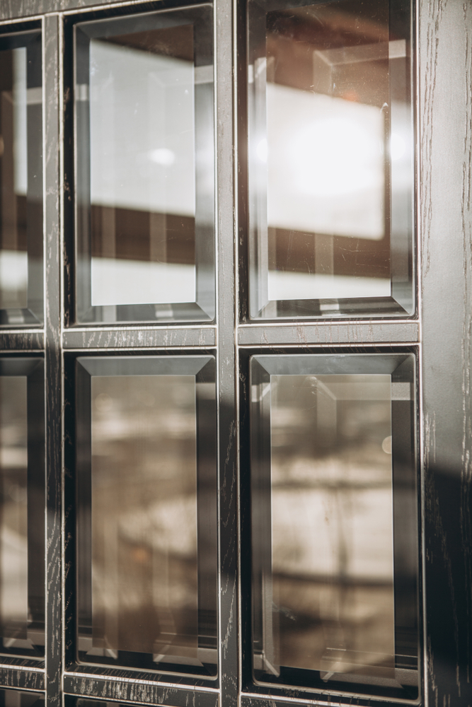 Beveled glass window on a front door.